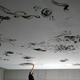 Illustration for article titled Modern Day Michelangelo Paints Ceilings With BIC Lighter